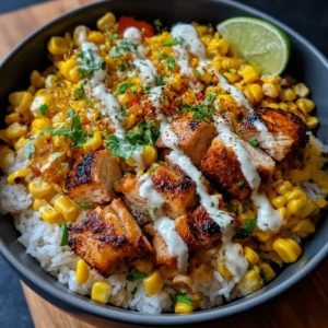Tasty Street Corn Chicken Bowl, Jasmine Rice, Chicken, Corn, Light Mayo<br> <br><div style="display: flex; justify-content: center; align-items: center; gap: 10px; font-family: Arial, sans-serif;"><div style="text-align: center; color: #21924e;"> <p style="margin: 0; font-size: 15px; font-weight: bold;">45G</p> <p style="margin: 0; font-size: 10px; text-transform: uppercase;">Protein</p> </div> <div style="border-left: 2px solid #21924E; height: 40px;"></div> <div style="text-align: center; color: #21924e;"> <p style="margin: 0; font-size: 15px; font-weight: bold;">145G</p> <p style="margin: 0; font-size: 10px; text-transform: uppercase;">Carbs</p> </div><div style="border-left: 2px solid #21924E; height: 40px;"></div> <div style="text-align: center; color: #21924e;"> <p style="margin: 0; font-size: 15px; font-weight: bold;">130G</p> <p style="margin: 0; font-size: 10px; text-transform: uppercase;">Veg</p> </div> <div style="border-left: 2px solid #21924E; height: 40px;"></div><div style="text-align: center; color: #21924e;"> <p style="margin: 0; font-size: 15px; font-weight: bold;">20G</p> <p style="margin: 0; font-size: 10px; text-transform: uppercase;">Fat</p> </div></div>